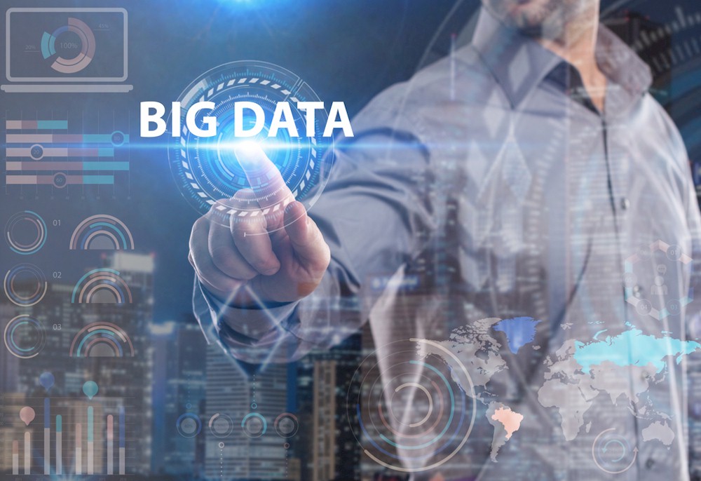 A man pointing to "Big Data"
